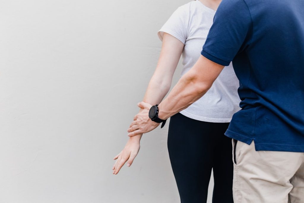 a-man-and-a-woman-standing-next-to-each-other-cext3n-04iw